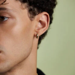 Gold Huggie Earring 17 Gold Huggie Earring -Serge DeNimes Jewelry Shop Gold Plain Huggie Earring Model Shot 2023