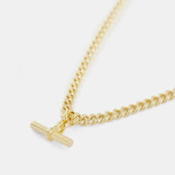 Gold Curb T-Bar Necklace -Serge DeNimes Jewelry Shop Gold TBar Chain Product Shot Grey c68a3c01 57e2 4a80 a626 4c713326d3cd