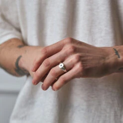 Silver Envy Signet Ring 20 Silver Envy Signet Ring -Serge DeNimes Jewelry Shop Silver Envy Ring Model Shot 198cb23b 550f 4c04 8833 b3b87faaba32